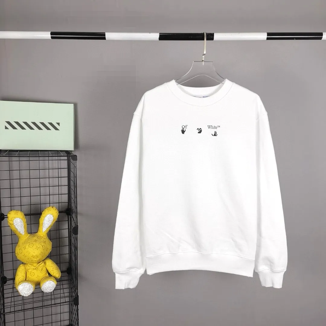 22SS top tested version environmentally friendly series OFFWHITE OW world environmentally friendly green big tree graffiti pure cotton loose unisex round neck sweatshirt I won’t introduce much else here, just get to the point. This printed tree is different from the short-sleeved ones. The leaf shape part of the printing is replaced by embroidery. This cannot be seen from the picture level (you will definitely make a mistake when you look at the picture). Many versions on the market directly look at the picture and make the pattern, without worrying about this detail.  The fabric is made of 480g fish scale terry cotton fabric, and the hem is slit. This is the key detail.  The white front chest is the new slogan of the trumpet, and the back is also different. They are all framed by the classic and iconic large warning arrows. The black arrows are lake green, with a few white water-like patterns added; the white ones are sky blue arrows, with a big tree inside with branches and leaves filling the entire pattern. Both pieces are interpretations of traditional retro hand-painted graffiti painting techniques, which fully embody the natural and environmentally friendly atmosphere.  Color: White Size: XS-L P:370